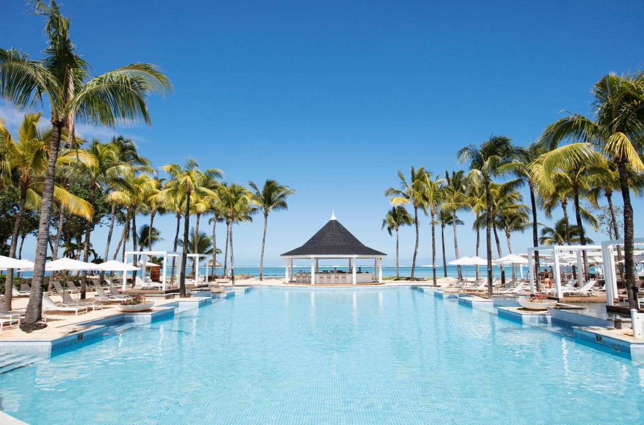 Heritage Le Telfair Golf&Wellness Resort Bel Ombre Exterior foto Infinity pool at Sandals South Coast