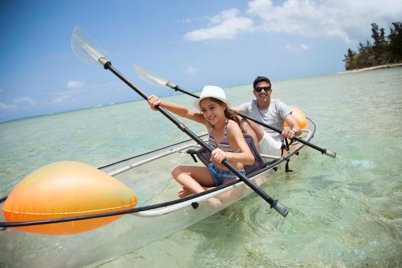 Heritage Le Telfair Golf&Wellness Resort Bel Ombre Exterior foto Kayaking at Sandals Emerald Reef Resort