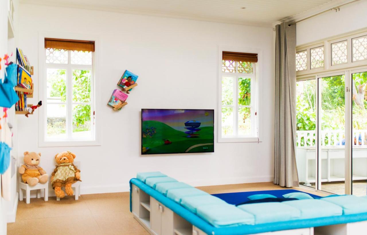 Heritage Le Telfair Golf&Wellness Resort Bel Ombre Exterior foto A child's bedroom with a television