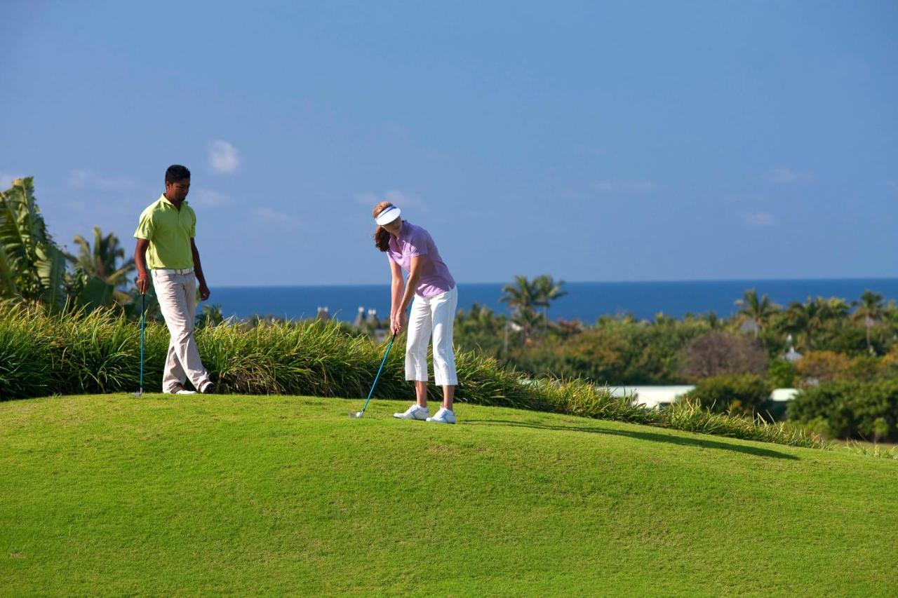 Heritage Le Telfair Golf&Wellness Resort Bel Ombre Exterior foto Golfers at the Four Seasons Resort